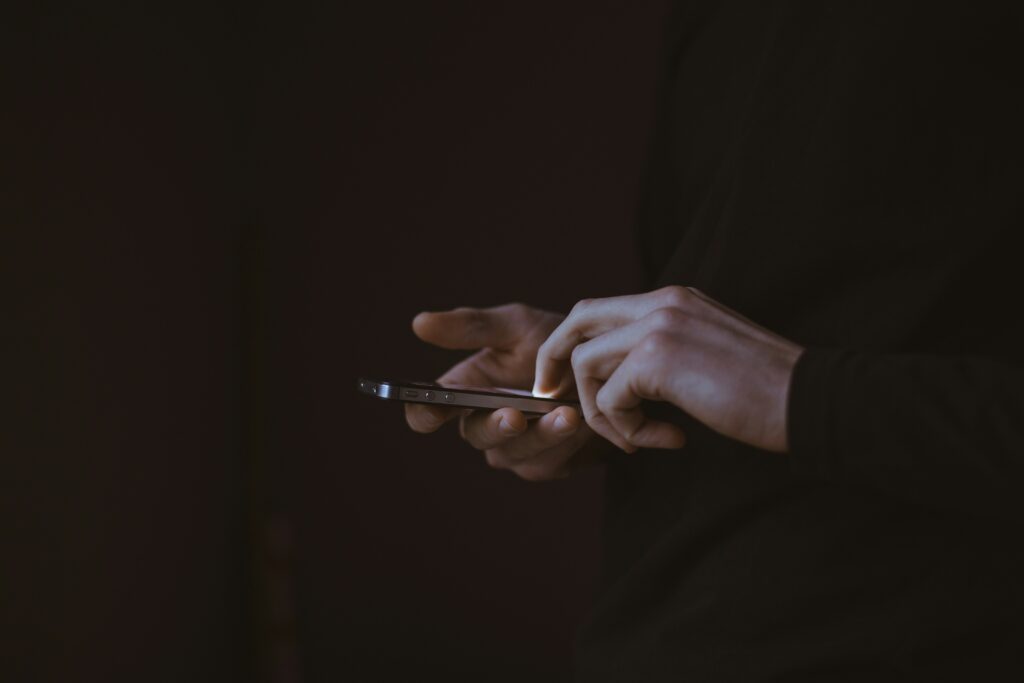 morning anxiety causes routine for better energy sleep chronotypes - social media addiction - person on phone