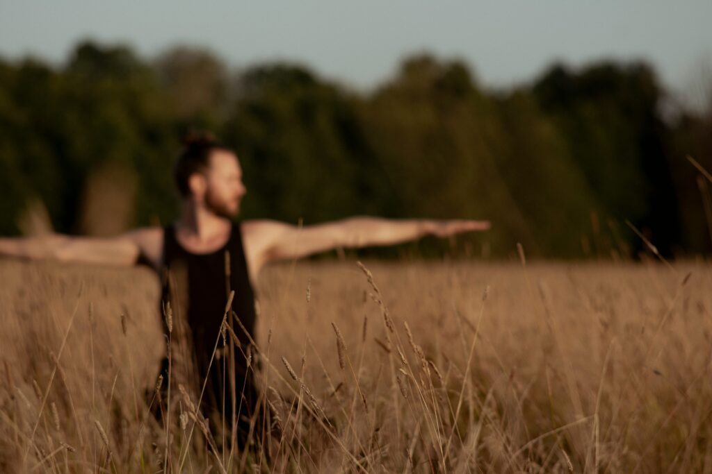 labor day wellness rituals man stretching outside micro habits for anxiety