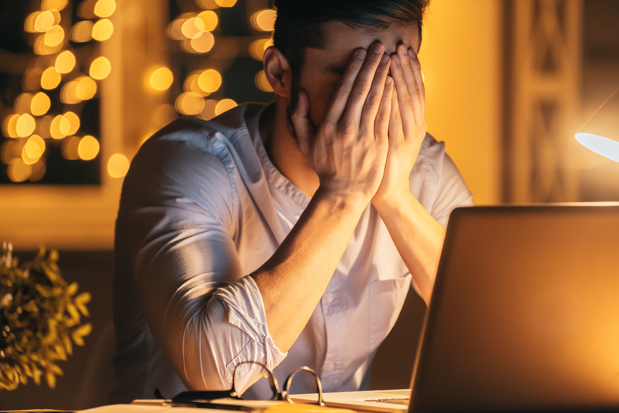 stressed out frustrated man workplace wellness