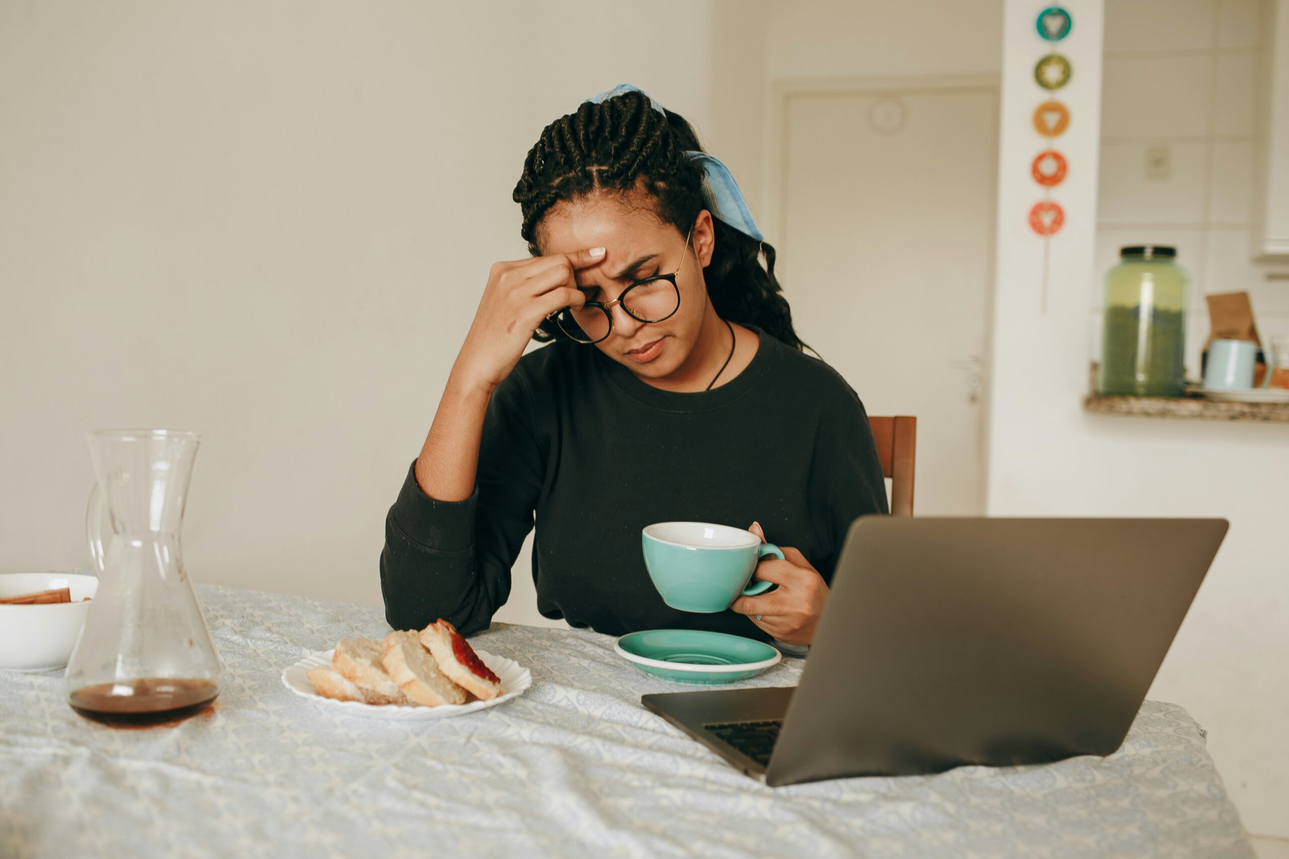 woman stressed out on her computer while working
