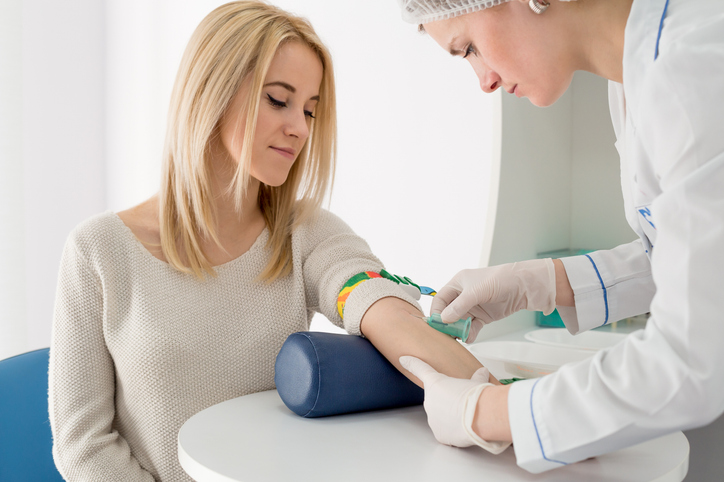 Blood test preparibg in the white laboratory with doctor and beautiful girl lab test membership