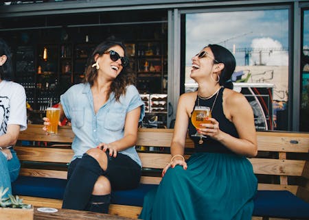 friendship dynamics - two ladies laughing