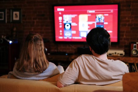 watch list for mental health awareness couple watching tv