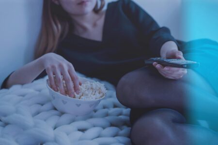 watch list for mental health awareness woman watching tv