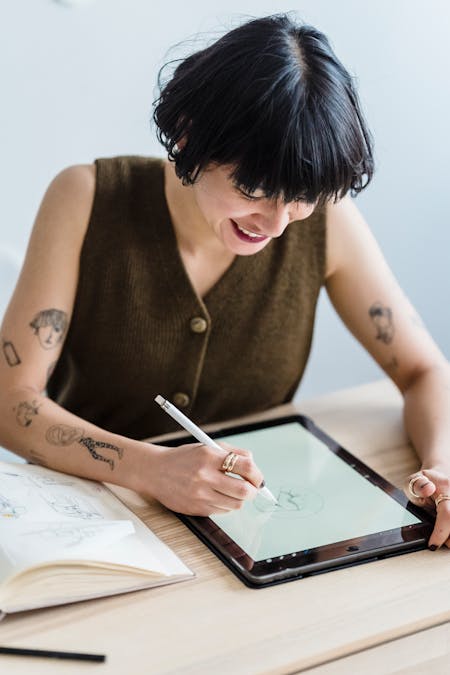 woman smiling at a tablet how to manage adhd without medication