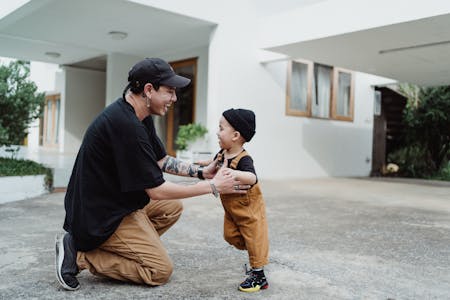 balanced life - man with child