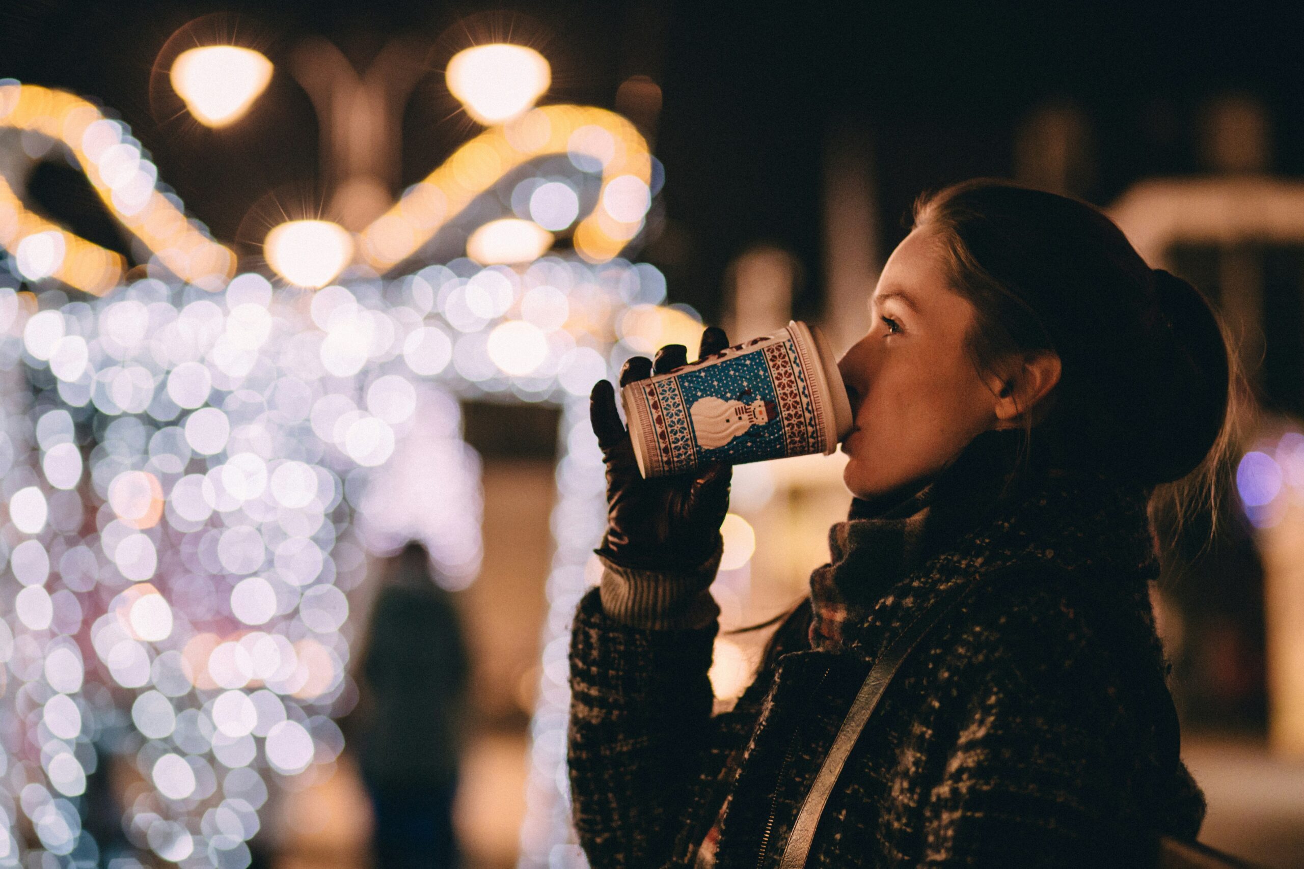 woman drinking coffee at christmas holiday stress relief 