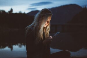 social media addiction - woman on phone
