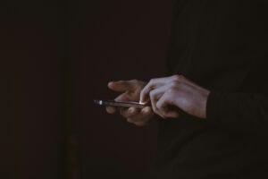 social media addiction - person on phone 