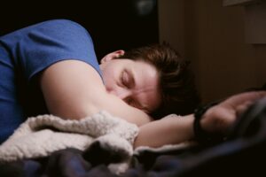 man taking a nap - how to break fitness plateaus