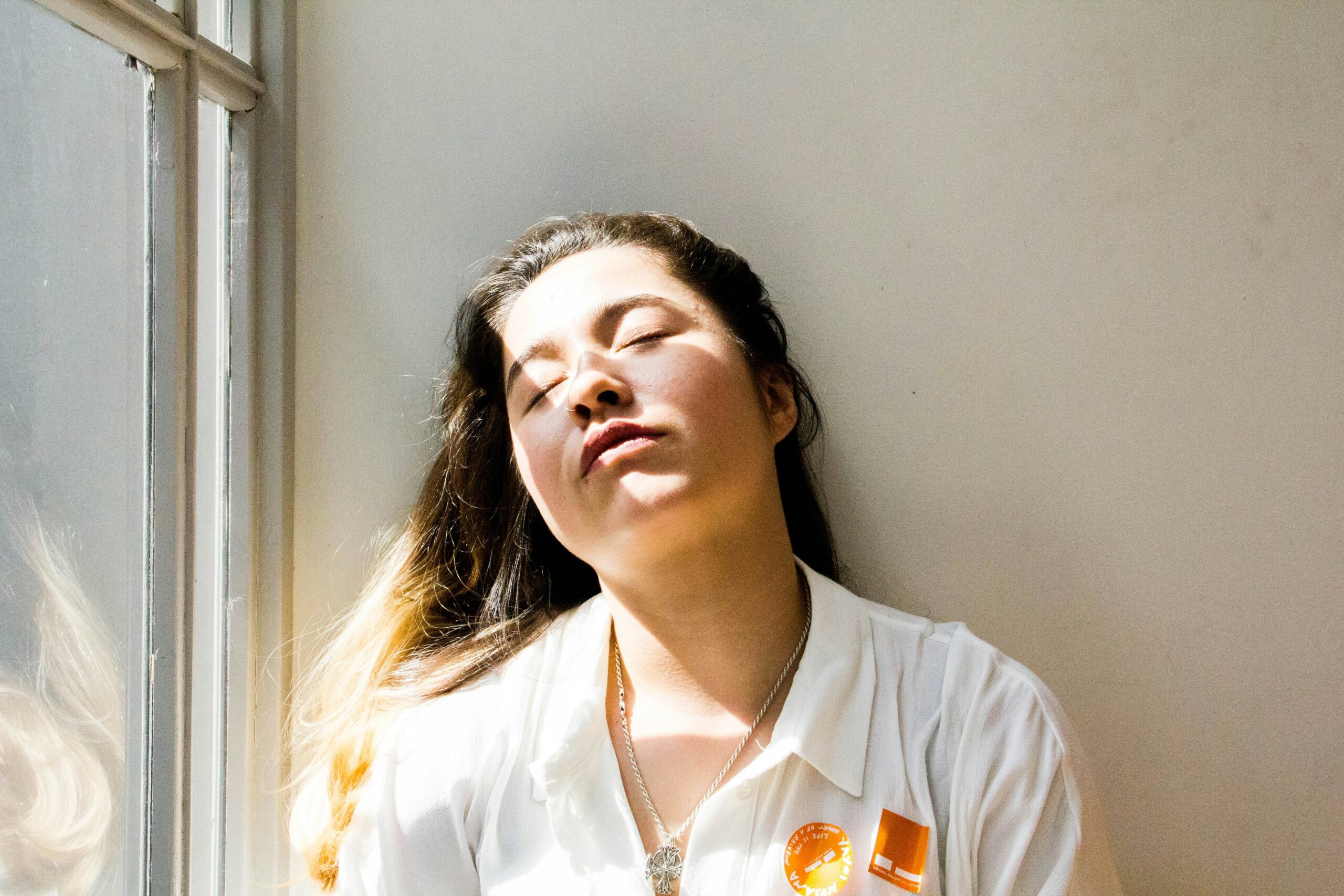 chronic fatigue solutions - woman at window