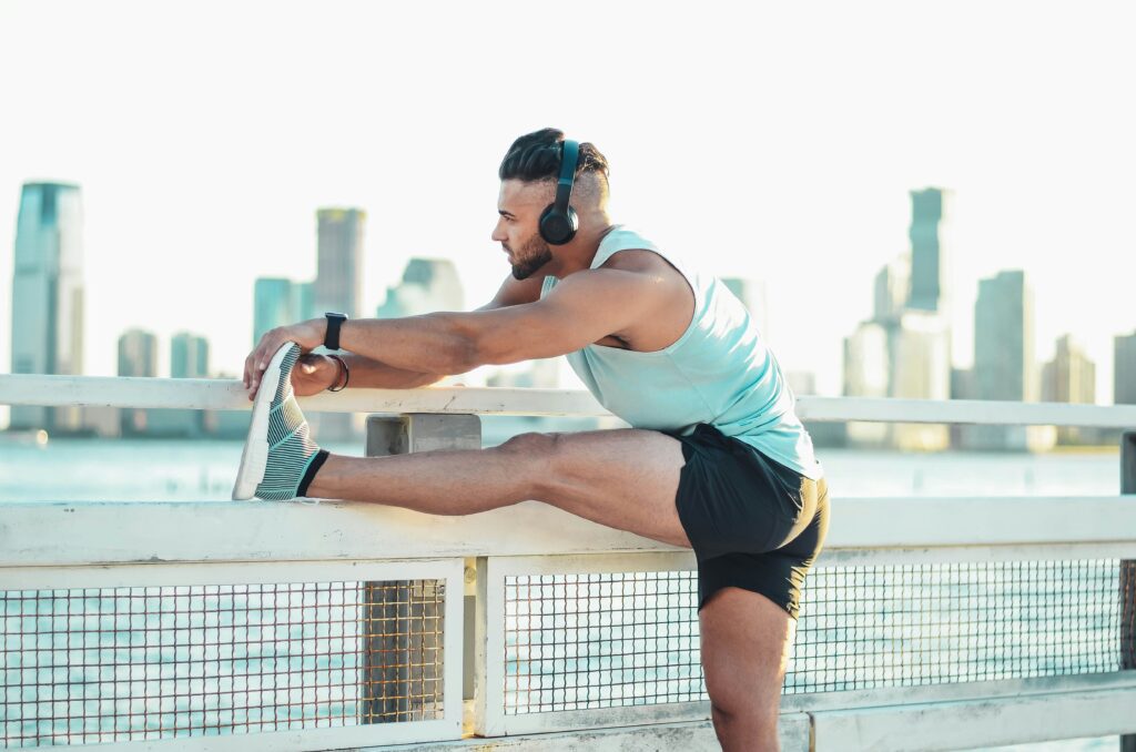 sleep chronotypes What happens if you don't stretch after a workout - runner man stretching - endurance exercises