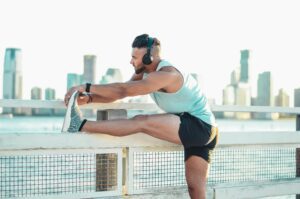 What happens if you don't stretch after a workout - runner man stretching - endurance exercises
