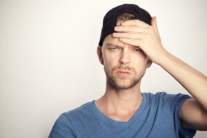 brain fog causes - confused man 