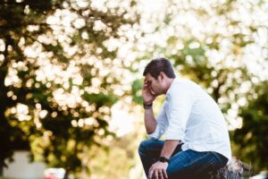 dopamine and serotonin - sad man thinking