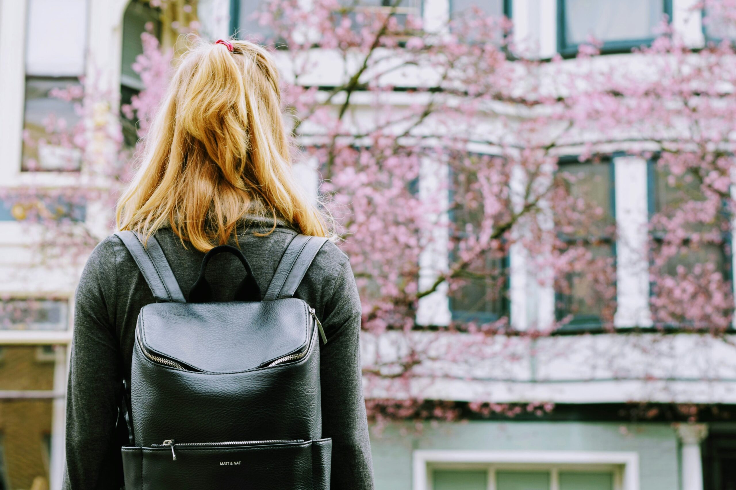 mental health in college - girl with backpack on