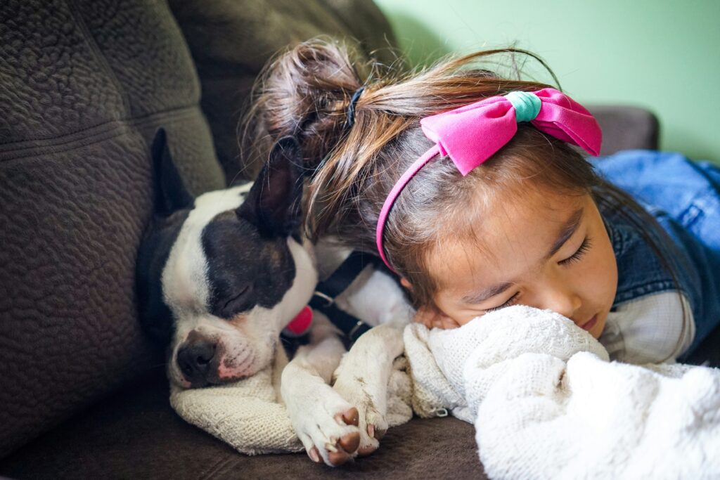 omega-3s melatonin for kids - sleeping kid and puppy