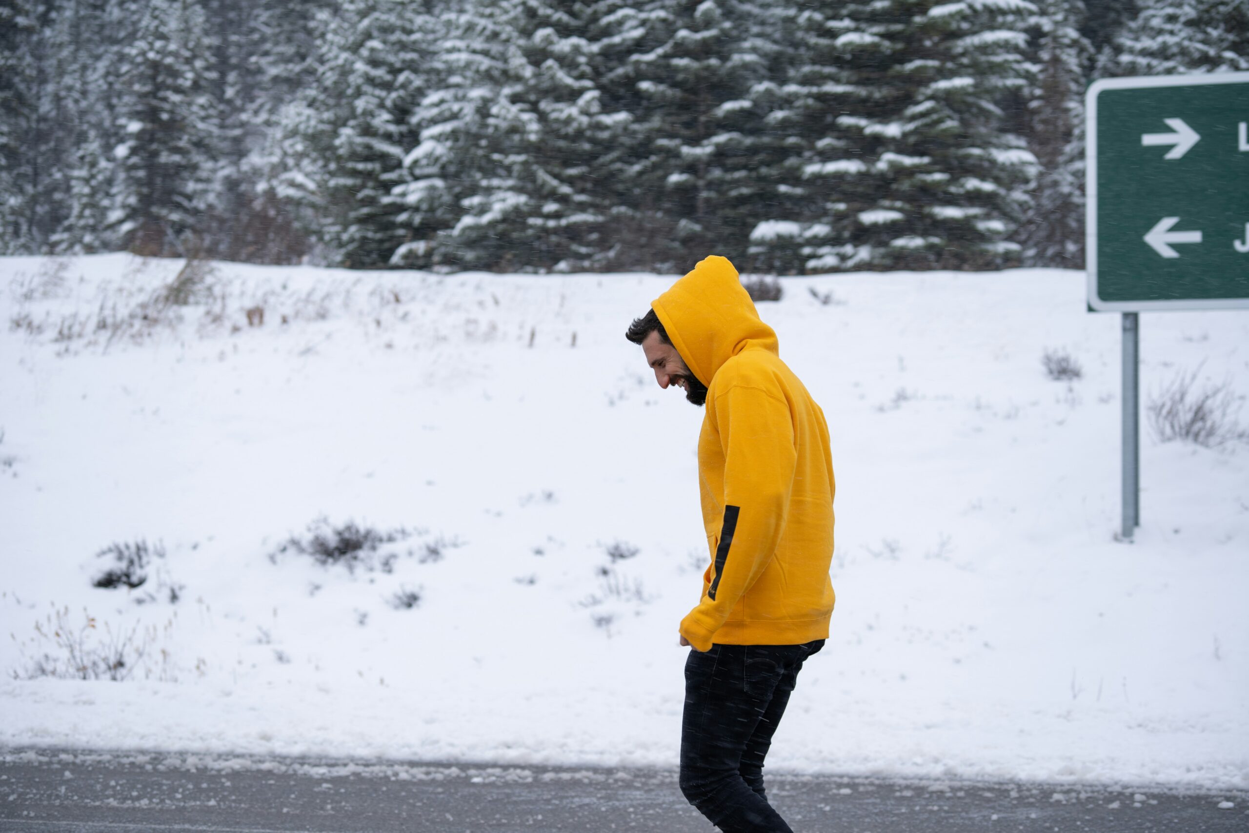 man walking in the winter in snow vitamin d