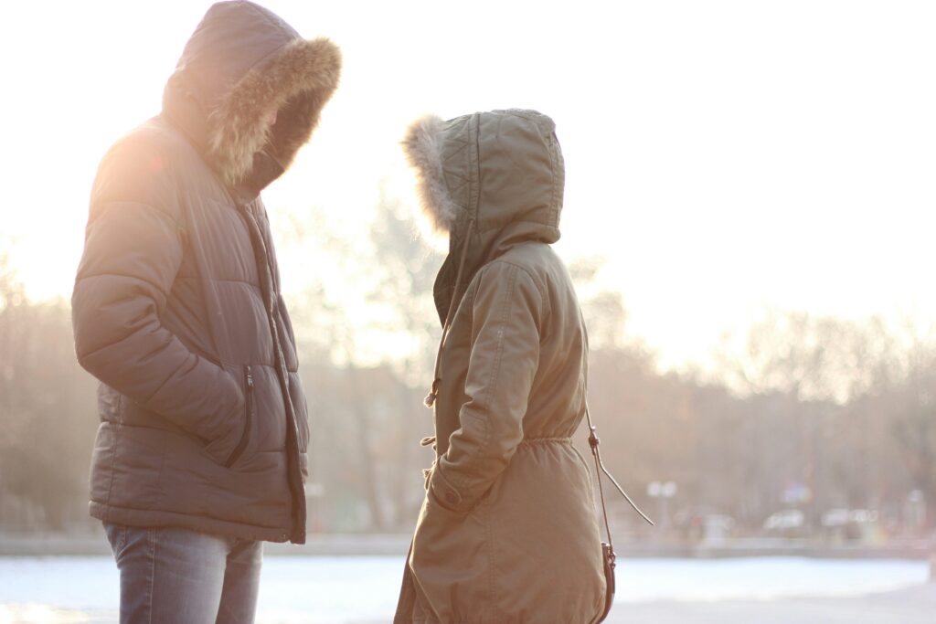 sleep chronotypes - people in winter standing in the sun getting vitamin d