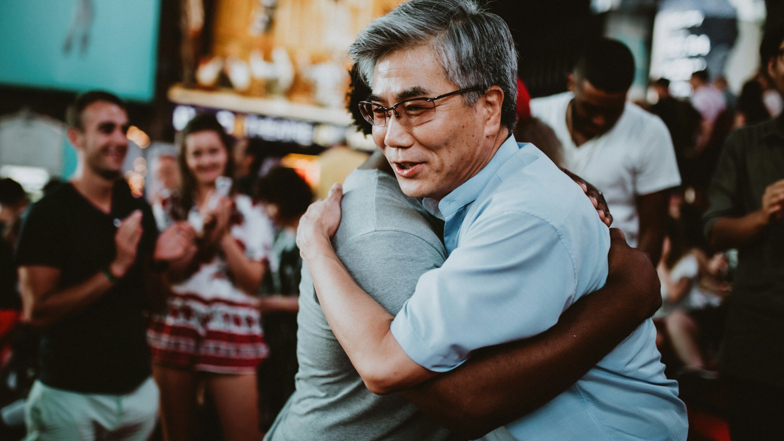 hugging man practicing gratitude