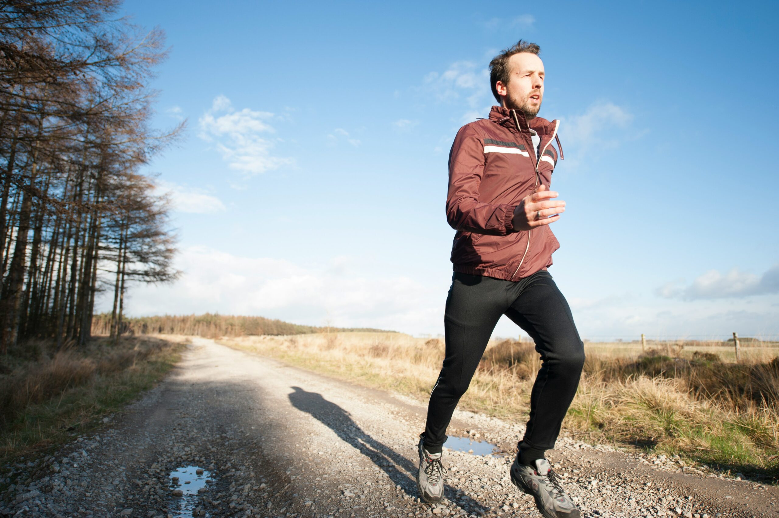fitness goals man running outside