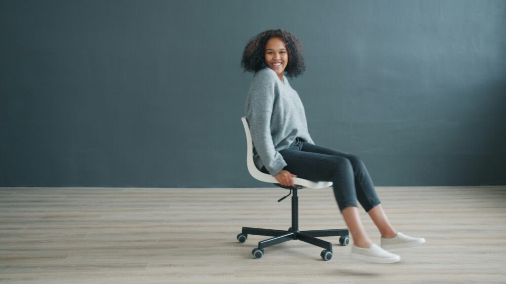 woman at office happy workplace wellness