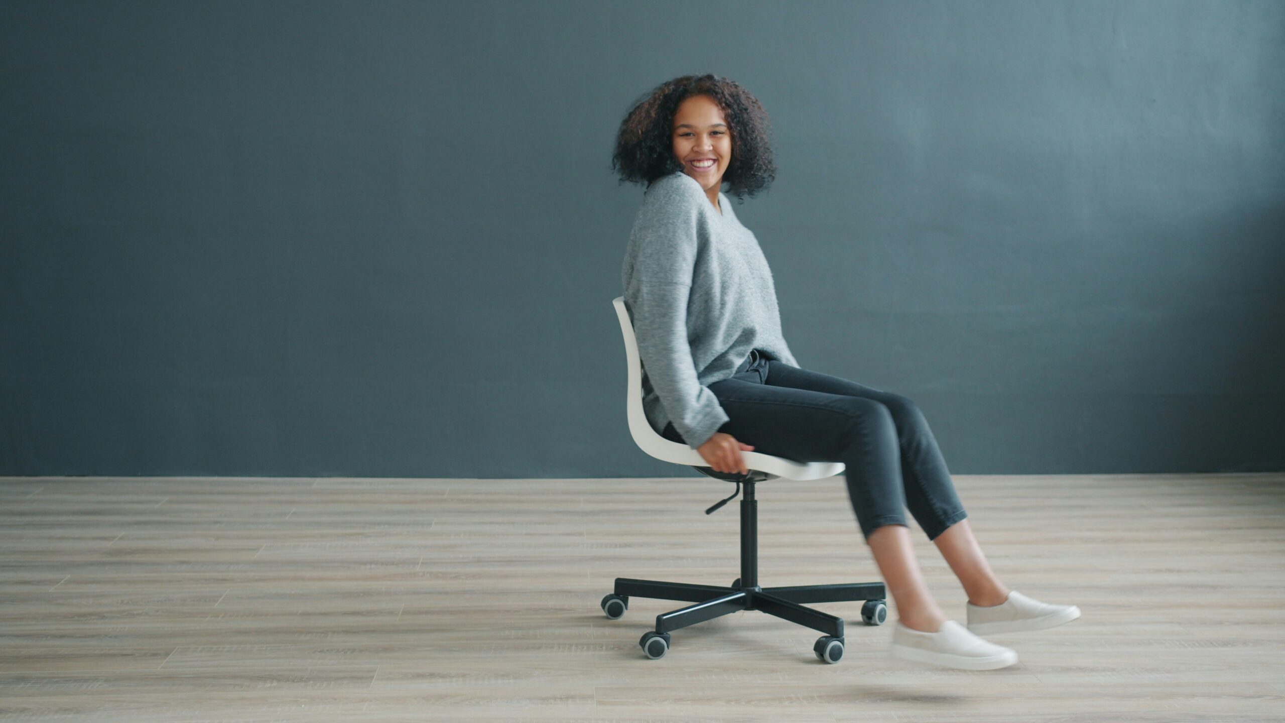 woman at office happy workplace wellness