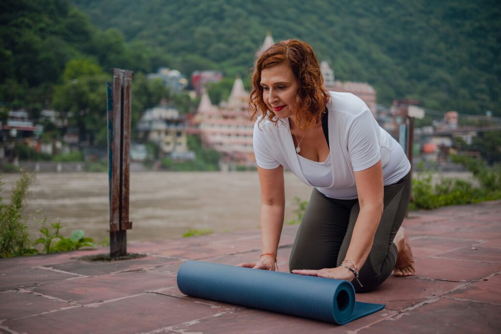 woman exercising doing yoga soft movement workout 