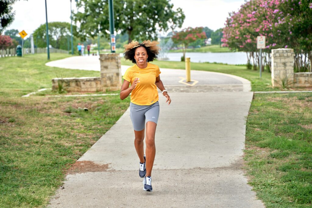 supplements for summer energy. woman running outside start running after 40