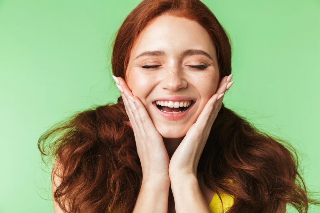 smiling happy woman supplements for healthy skin