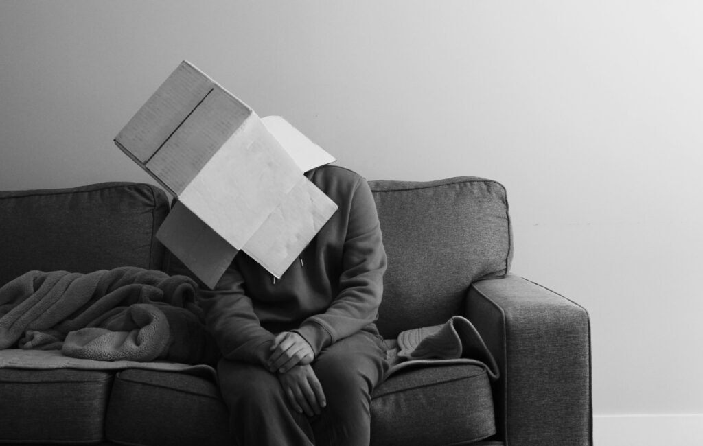 how to stop overthinking person with box on head
